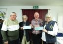 Lodge Chairman, David Craddock, presenting the charity cheques