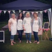 GREAT BAKE: Sue and some of her supporters helping to sell her cakes at a fayre