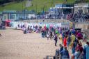 Customers fill the seafront at eat: Lyme Regis 2023