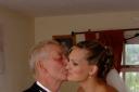 FATHERLY LOVE: Kristy Stordy with her father on her wedding day