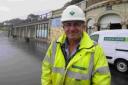 Martin Nott with the Marine Parade shelters in Lyme
