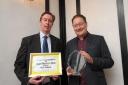Chris Chibnall accepts his award from Scott Condliffe