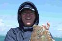RETURN: Rod Lewis with his personal best plaice of 5lb 8oz
