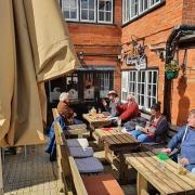 Punters enjoy a pint in the Tiger Inn beer garden Picture: Bradley White