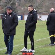 Adam Herring, centre, will step down to become assistant boss under manager Murray Legg for 2024/25