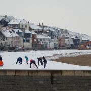 Snow covers Lyme Regis on March 19, 2018