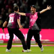 Somerset's Lewis Gregory, right, celebrates with Matt Henry after winning the T20 Blast