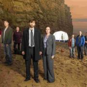 The cast of ITV Drama Broadchurch on the beach at West Bay. Photo credit ITV Drama.