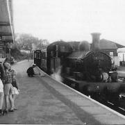 LOOKING BACK: One of the last steam trains arrives at Lyme Regis railway station.