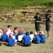 The Jurassic Coast Trust's Sam Scriven with a school group near the site in 2014 Picture: Jurassic coast Trust