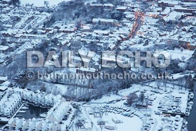 Christchurch Priory  in the snow, taken by Gary Ellson of  Bournemouth Helicopters.  