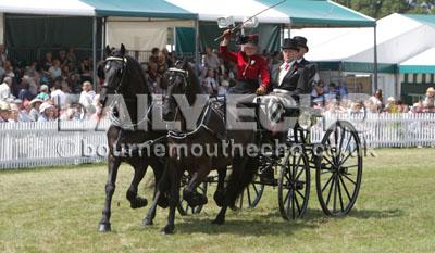 The second day of the 2011 New Forest Show.  Horse and Carriage teams in the East Ring. 