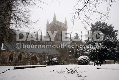 Wimborne Minster shrouded in freezing fog the day after first snowfall of the year where temperatures plummeted to minus 10 in places.