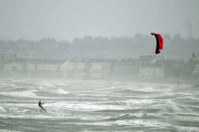 Stormy weather picture, kite surfing off Weymouth beach. 