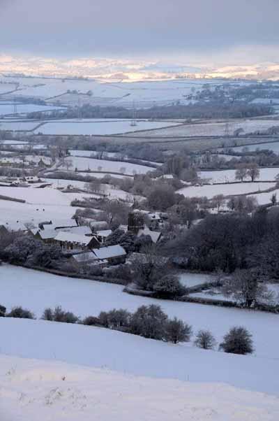 More snow in December 2010 - View across Askerswell showing the blanket of snow covering West Dorset .