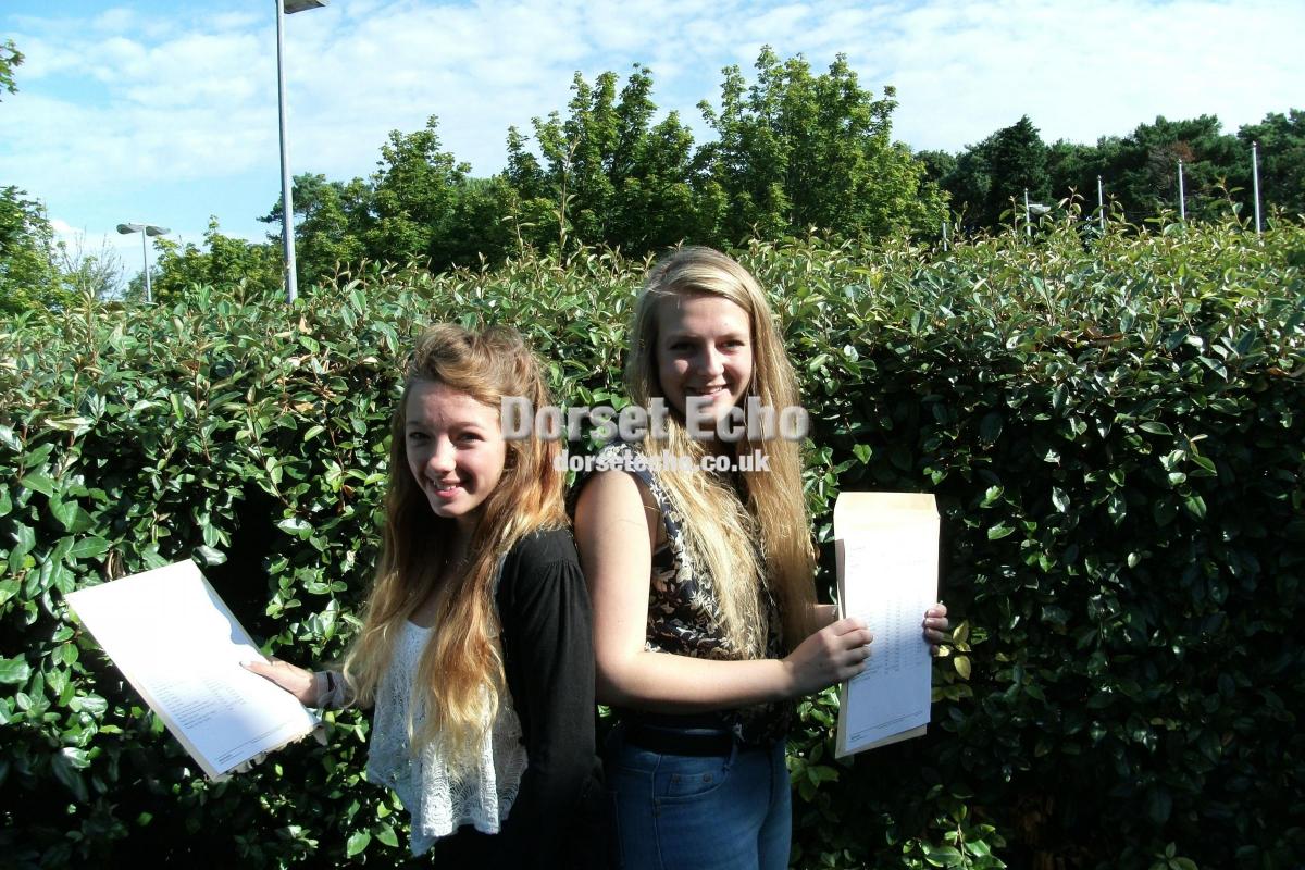 GCSE results August 22, 2013.
Sir John Colfox School, Bridport
Photo: Anne Bell
Paige Tait with Tierney Thomas.
