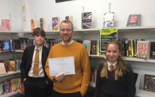 L-R: Ryan in Year 10, Head of Careers teacher Michael Thompson and Summer in Year 11 from Sir John Colfox Academy