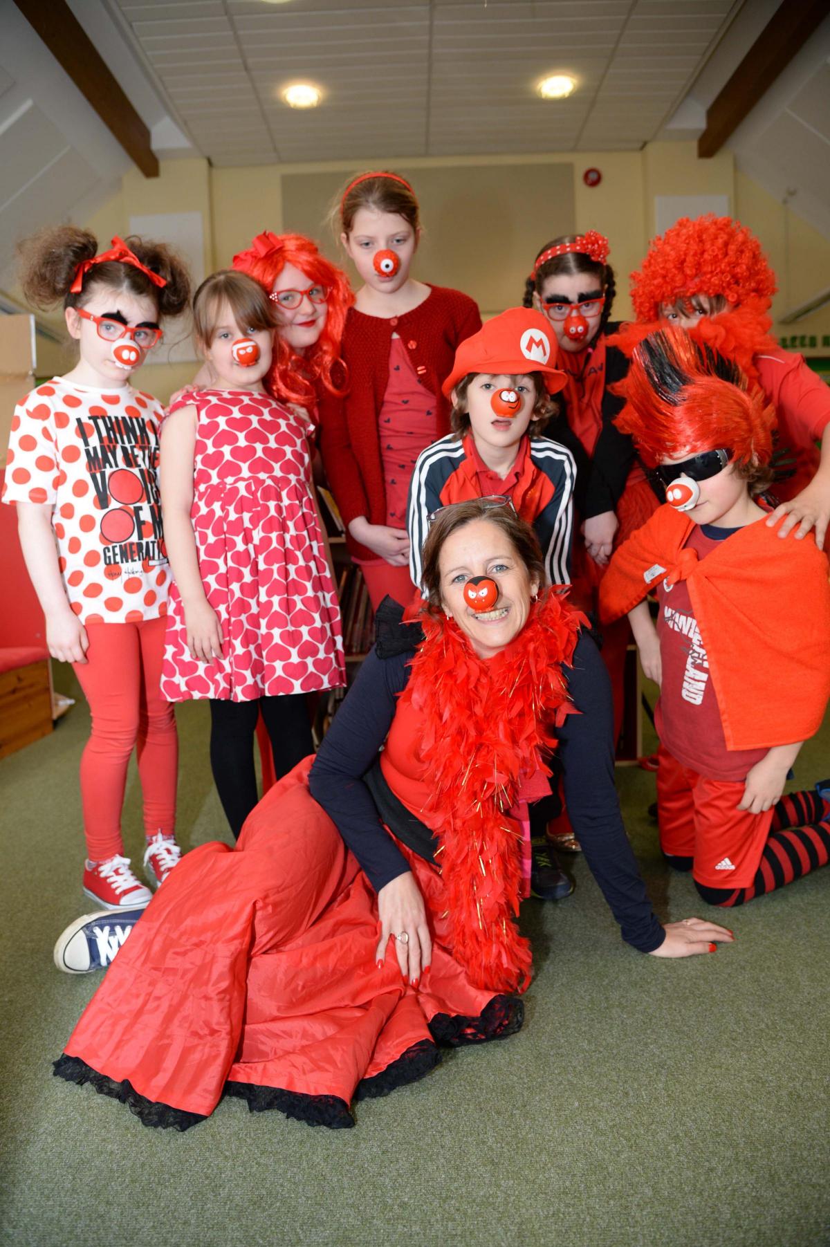 Bridport Primary school head teacher Debbie Brown joins key stage 2 pupils for Red Nose Day 2015