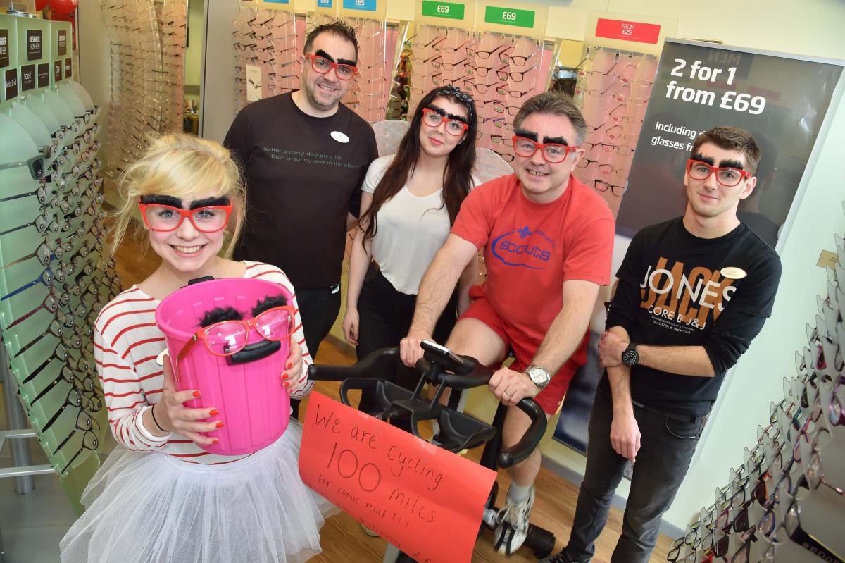 Staff members at Bridport branch of Specsavers doing a 100 mile spin cycle in store to raise money for Comic Relief - Staff members Chloe Norman, Mike Rowling, Jess Bull, Chris Newall and Tom Stroud