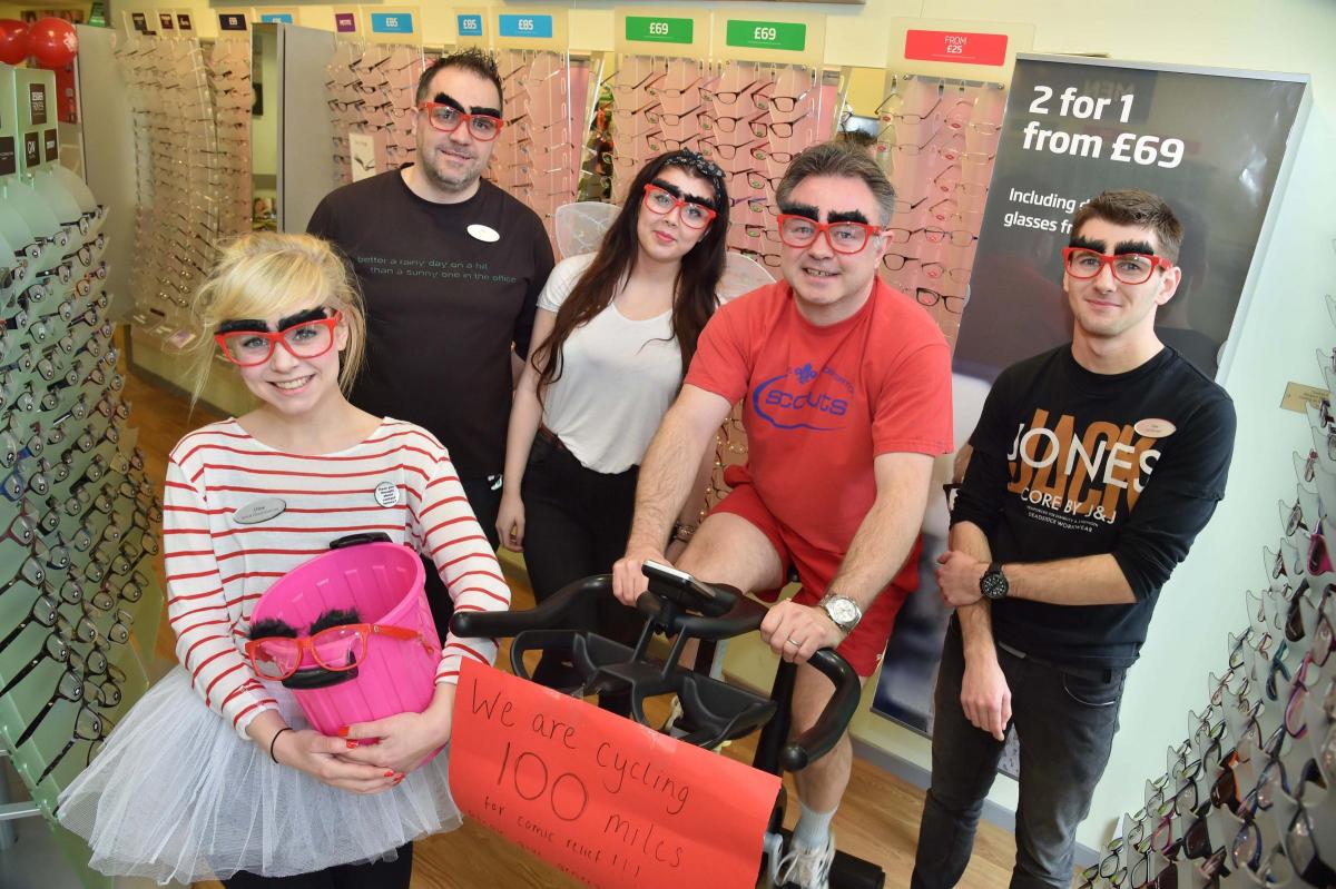 Staff members at Bridport branch of Specsavers doing a 100 mile spin cycle in store to raise money for Comic Relief - Staff members Chloe Norman, Mike Rowling, Jess Bull, Chris Newall and Tom Stroud
