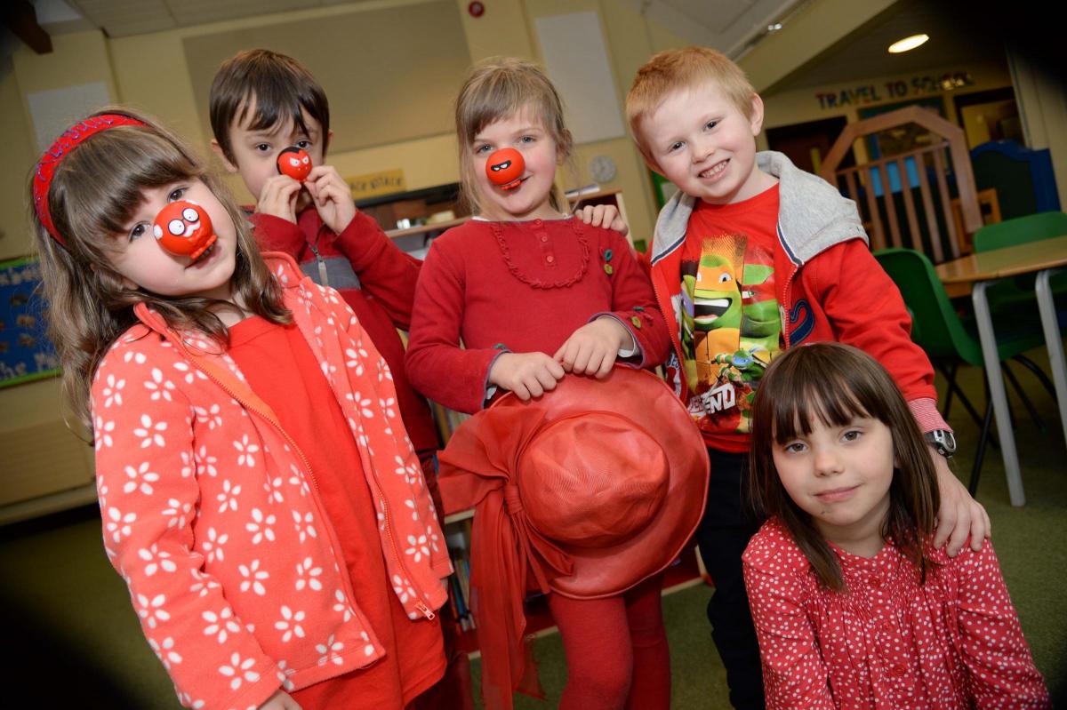 Bridport Primary school key stage 1 pupils dress in red for Red Nose Day 2015