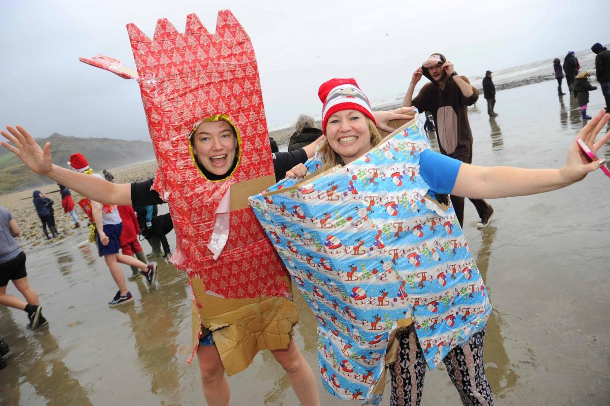 Kate Fortman and Rebecca Harper at the Charmouth Christmas Day Swim 2015 Picture: Graham Hunt Photography