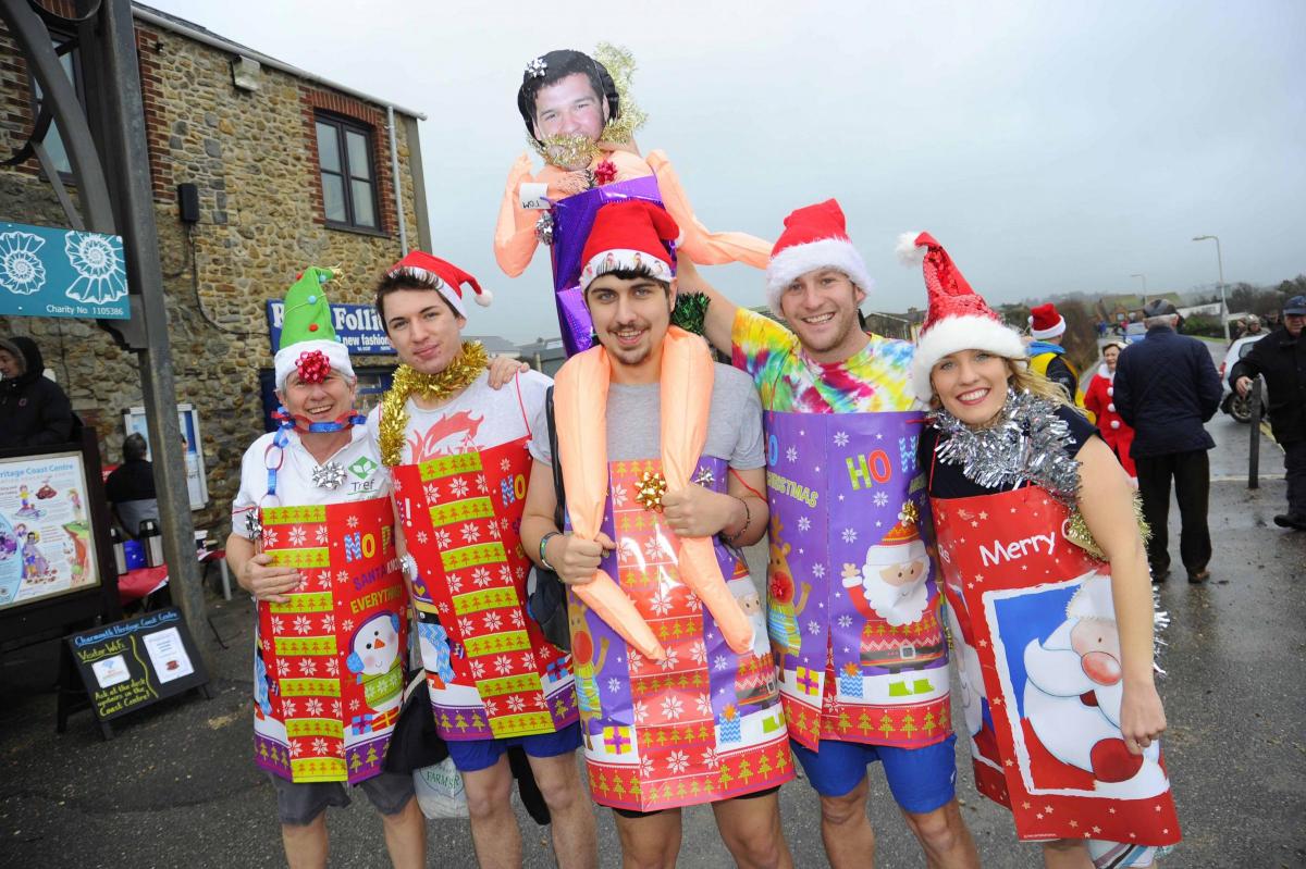 John Summers, Harry Perkin, Alex Perkin, Mark Summers and Annabel Summers at the Charmouth Christmas Day Swim 2015 Picture: Graham Hunt Photography