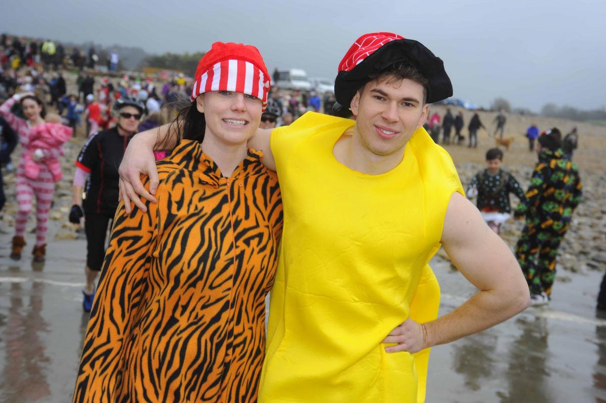 Nadine Seal and Jerry Robinson at the Charmouth Christmas Day Swim 2015 Picture: Graham Hunt Photography