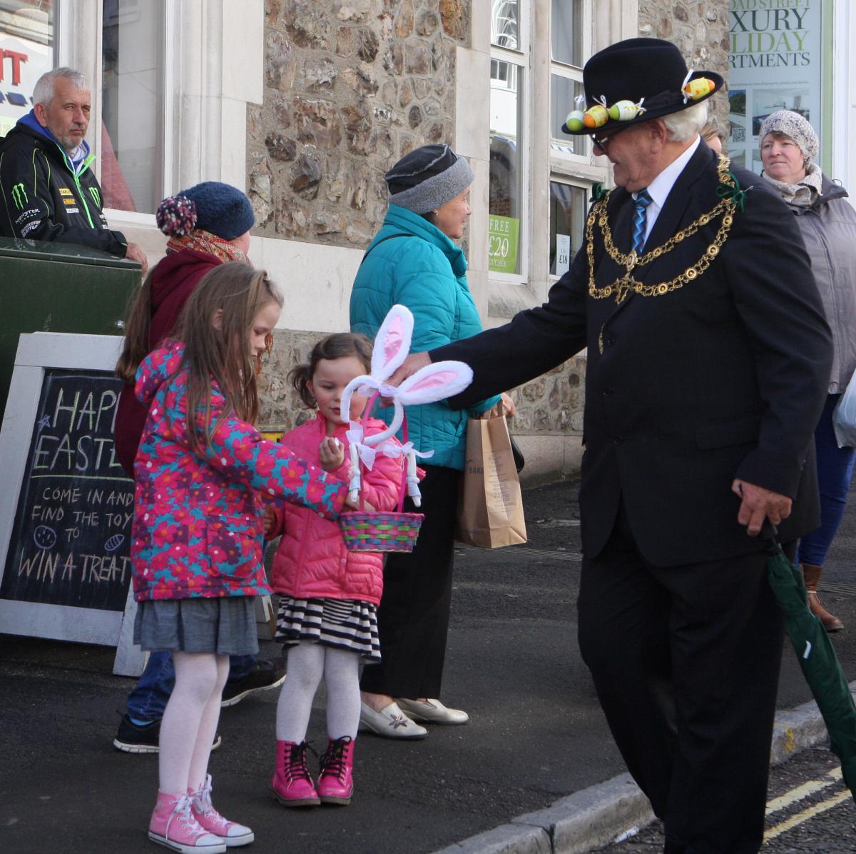 Mayor, Cllr Owen Lovell giving out chocolate eggs Picture: MAISIE HILL