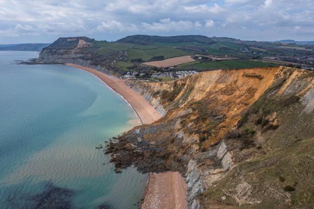 Bridport and Lyme Regis News: Cliff fall between Seatown and Eype Beach last week Picture: James Loveridge Photography