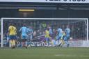 Simon Walton, out of view, scores Havant and Waterlooville’s solitary goal as the Hawks beat Weymouth 1-0 		            Pictures: MARK PROBIN