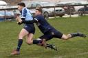 Lewis Allan, left, scores a try in the corner for the Seahorses