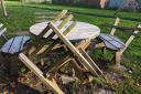 The picnic bench has been left unusable due to the damage it sustained