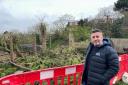 WORRY: Adam Giagnotti, owner of the Olive Branch and  Impasto, in his garden after the Reservoir Lane wall collapse in February