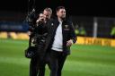 Oxford United head coach Des Buckingham celebrates at full-time