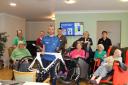 Jamie Hill with residents at Signature House