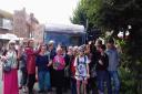END OF AN ERA: Passengers and campaigners wave goodbye to the last Saturday 40 bus in Bridport.