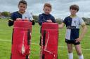 Young rugby players at Bridport Rugby Club with the damaged tackle bags Picture: Noel Gregory