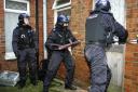RAID: Police execute a drugs warrant at a property