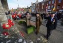 Residents, servicemen, veterans and councillors turn out in large numbers at Bridport in Dorset to pay their respects on Remembrance Sunday at the war memorial outside St Mary’s Church in South Street. 14th November 2021.  Picture Credit: Graham