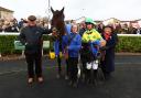 Freddie Gingell, second right, rode West Approach to victory              Picture: MATTHEW WEBB/THE JOCKEY CLUB