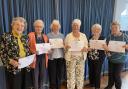 Celebrating 103 years of Chideock WI - Val Rivers, Clem Allan, Olive Noad, Audrey Skinner, Doreen Moore and Elizabeth Brunsden with their long service certificates