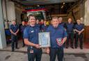 Assistant Chief Fire Officer Andy Cole (left) alongside retiring firefighter Peter Sartin. Picture: DWFRS