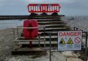 The upper walkway at The Cobb in Lyme Regis has been closed following storm damage