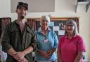 Rose Mock, president of the Uplyme and Lyme Regis Horticultural Society (centre) with Jim Johnson-Hills of Woodroffe School Gardening Club (left) and Rachel Jordan, trustee of Flamingo Community Pool (right).