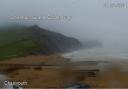 View of Stonebarrow and Golden Cap from the Charmouth beach camera