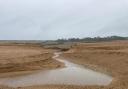 Large channel opens on Chesil Beach