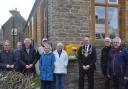 Mayor David Bolwell and members of the Bridport fellowship Church unveiling a new defibrillator