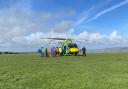 A man was seriously injured when his hang glider crashed into the cliff at Beer Head