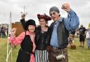 Sandy Malpas, Helen Goldman and Kevan Manwaring in costume at Pirate Day at West Bay, 2022